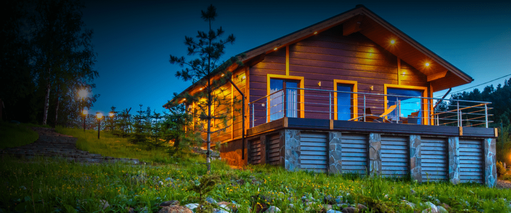 Modern illuminated home at dusk